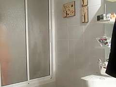 Chubby busty wife in bathroom drying