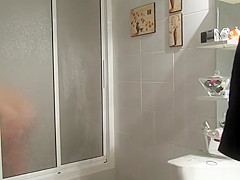 Chubby busty wife in bathroom drying