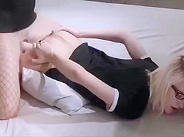 Classy blonde with spex fucked with strapless dildo