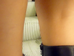 Close-up upskirt in escalator