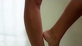 Comely breasty young slut giving a handjob