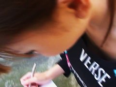 Confused Japanese girl shows her entire chest to a