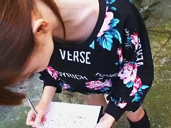 Confused Japanese girl shows her entire chest to a