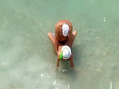 Couple fucking in water and shore