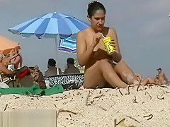 Couple split by Strangers on a nude beach