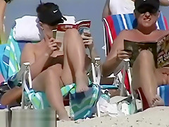 Couple split by Strangers on a nude beach