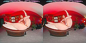 Curvy redhead shoves a toy up her ass in virtual reality