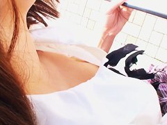 Cute Asian falls prey to a downblouse
