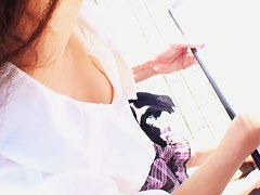 Cute Asian falls prey to a downblouse