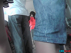 Dark-haired chick with bubble ass in the upskirt vid