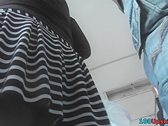Dark-haired chick with bubble ass in the upskirt vid