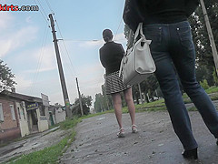Dark-haired chick with bubble ass in the upskirt vid