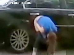 Desperate babe pees on a public suburban street