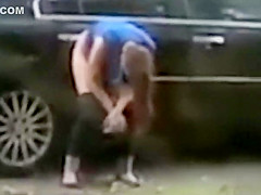 Desperate babe pees on a public suburban street