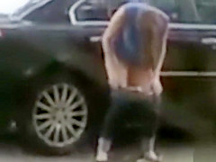 Desperate babe pees on a public suburban street