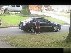 Desperate babe pees on a public suburban street