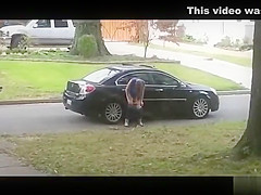 Desperate babe pees on a public suburban street