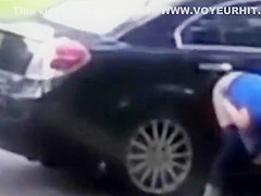 Desperate babe pees on a public suburban street