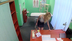 Doctor fucks blond beauty in office