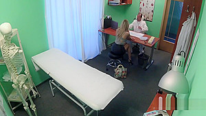 Doctor fucks blond beauty in office