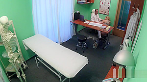 Doctor fucks blond beauty in office
