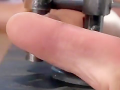 Ebony in device bondage whipped