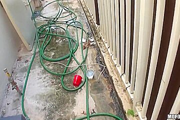 Evi Fox poses outside and sucks a long schlong