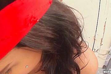 Evi Fox poses outside and sucks a long schlong