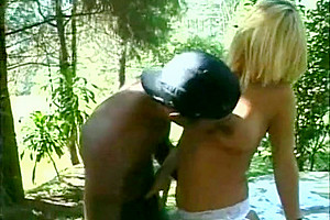 Excited Blonde tranny spreads her legs in the park