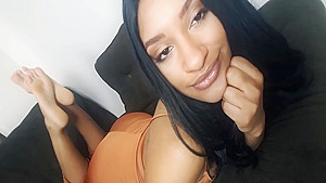 Exotic Ebony In An Elegant Dress Bares Her Beautiful Black Feet On The