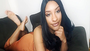 Exotic Ebony In An Elegant Dress Bares Her Beautiful Black Feet On The