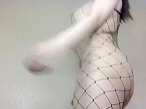 FISHNET SHEMALE WITH TIGHT BODY PLAYING AND STRIPPING