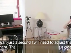 Female agent with strap on toy fucks babe