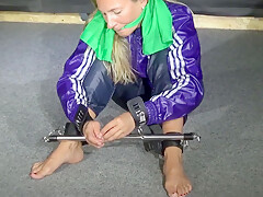 Get 2 Archive Videos With Sandra Enjoying Bondage In Her Shiny Nylon Rainwear