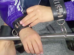 Get 2 Archive Videos With Sandra Enjoying Bondage In Her Shiny Nylon Rainwear