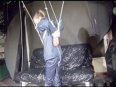 Get 2 Videos With Sandra Enjoying Bondage In Her Shiny Nylon Rainwear From Our 2016 Archive