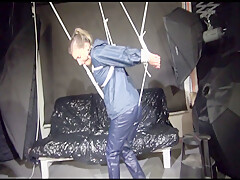 Get 2 Videos With Sandra Enjoying Bondage In Her Shiny Nylon Rainwear From Our 2016 Archive