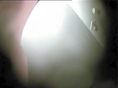 Girl in dressing room bares off and shakes the butt