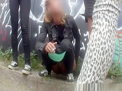 Girls secretly filmed peeing in public