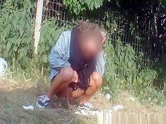 Girls secretly filmed peeing in public