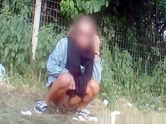 Girls secretly filmed peeing in public