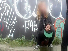 Girls secretly filmed peeing in public