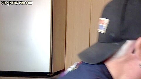 Gloryhole homemade DILF sucks cock in closeup at home