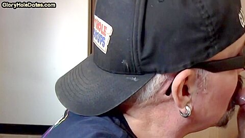 Gloryhole homemade DILF sucks cock in closeup at home
