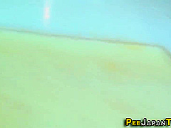 Hairy Asian Babe Urinates