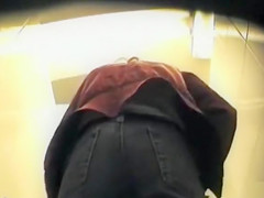 Hairy brunette pissing and captured on secret cam