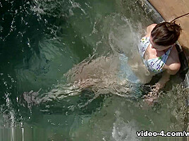 Hairy girl Veronica Snow goes swimming in her pool