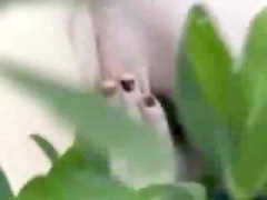 Hidden web camera masturbation in garden