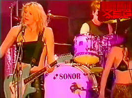 Hole's Courtney Love in topless on stage at the Big Day Out 1999