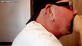 Homemade gloryhole DILF sucks and wanks cock in closeup